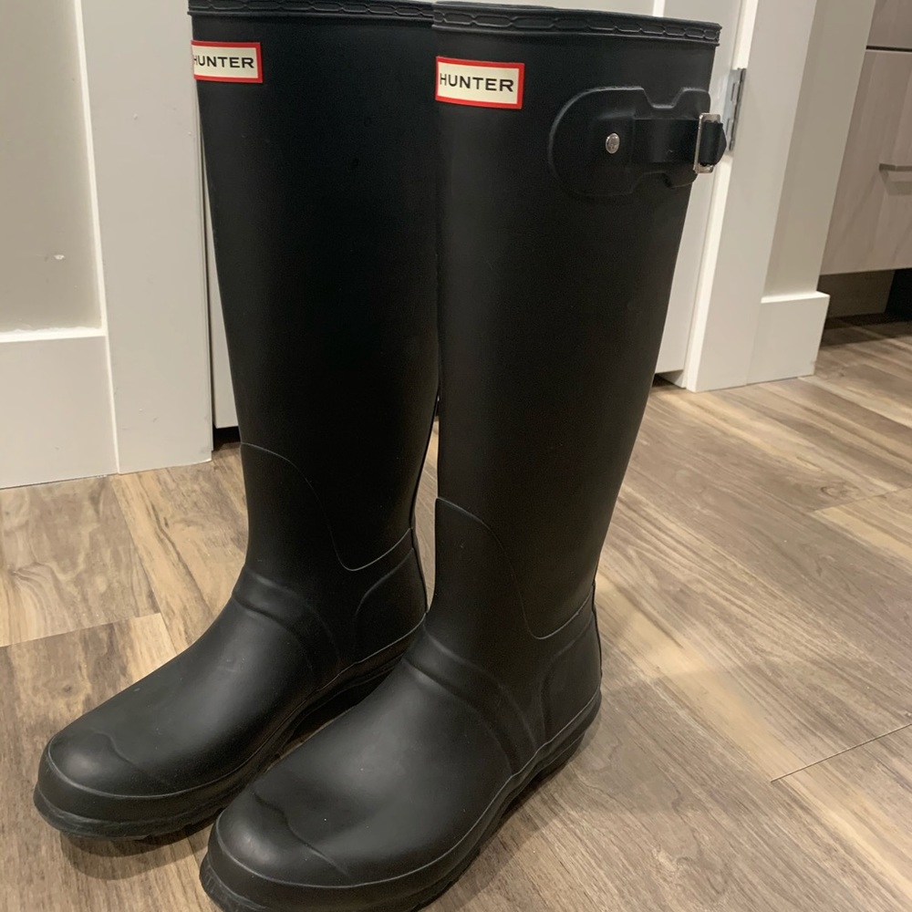 Like new tall black Hunter boots with boot socks